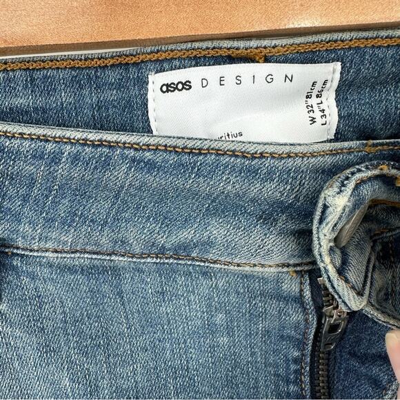 ASOS DESIGN skinny jeans in tinted mid wash with knee rips Size 32x34 - Picture 3 of 8